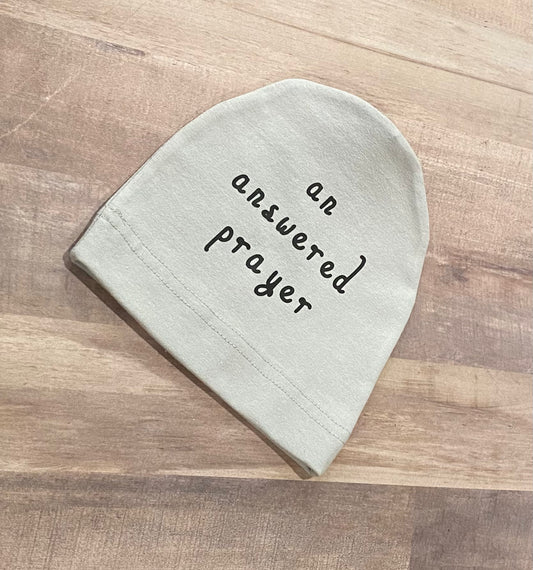 An answered prayer newborn hat